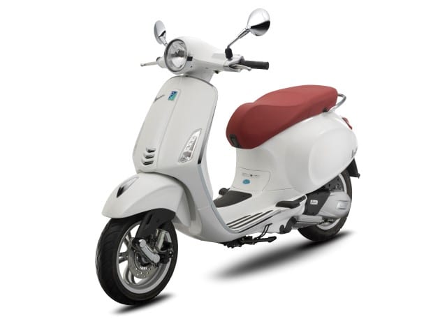 white 6v vespa scooter